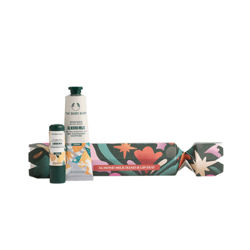 ბოდი შოპი - სასაჩუქრე ნაკრები XM25 G1 კამფეტის ფორმის ნუშის რძე ხელის ბალზამი 30მლ. ტუჩის სტიკი 4.2გრ